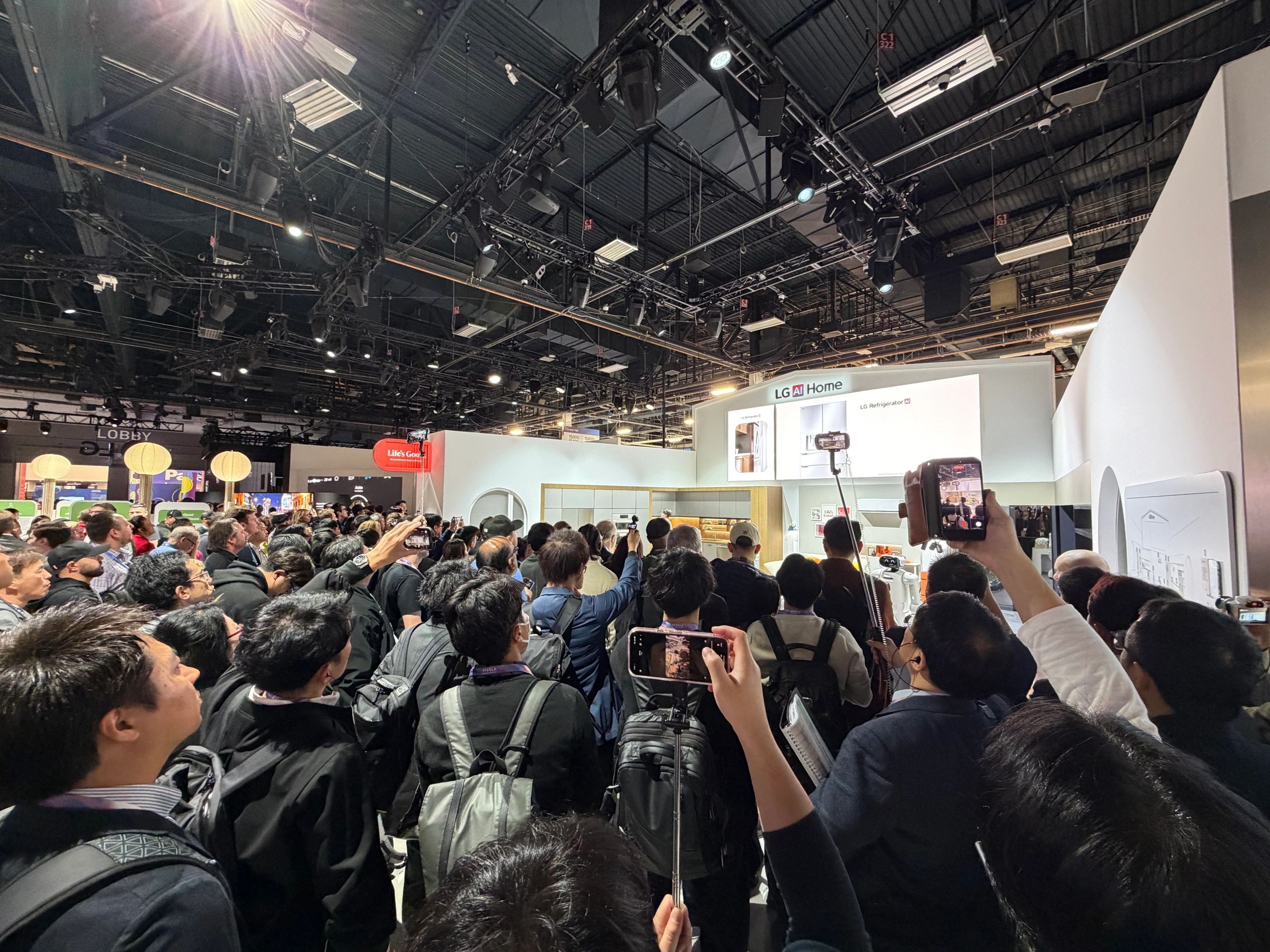 a black and white living room with a large tv