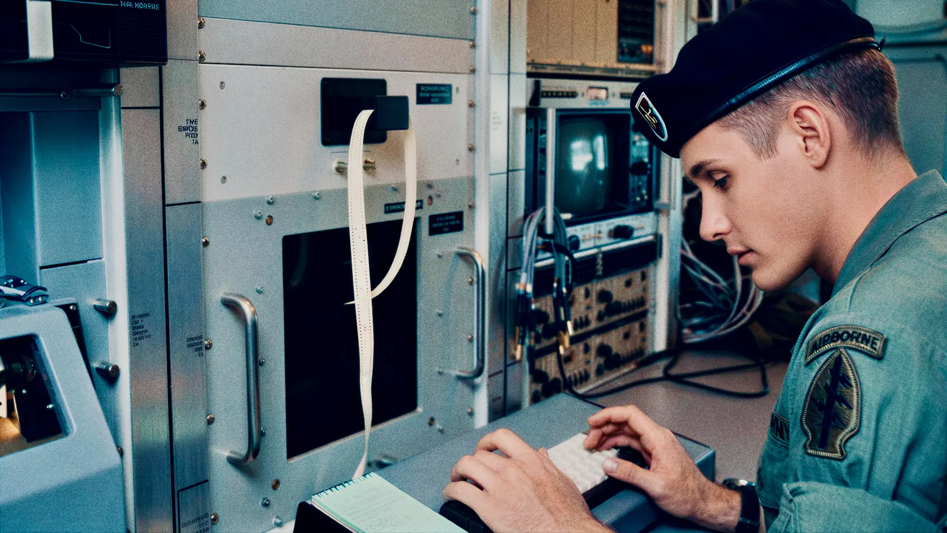 Paul Adams operating signal equipment at a U.S. Army communications station, circa 1986