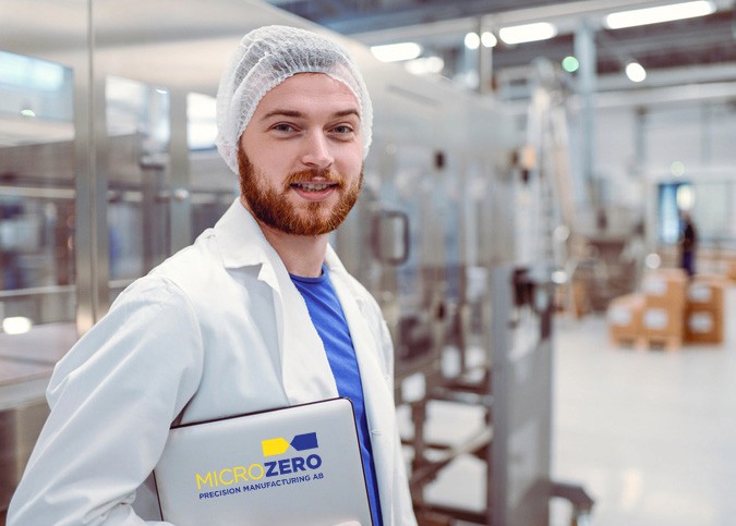 young technician working in microzero factory