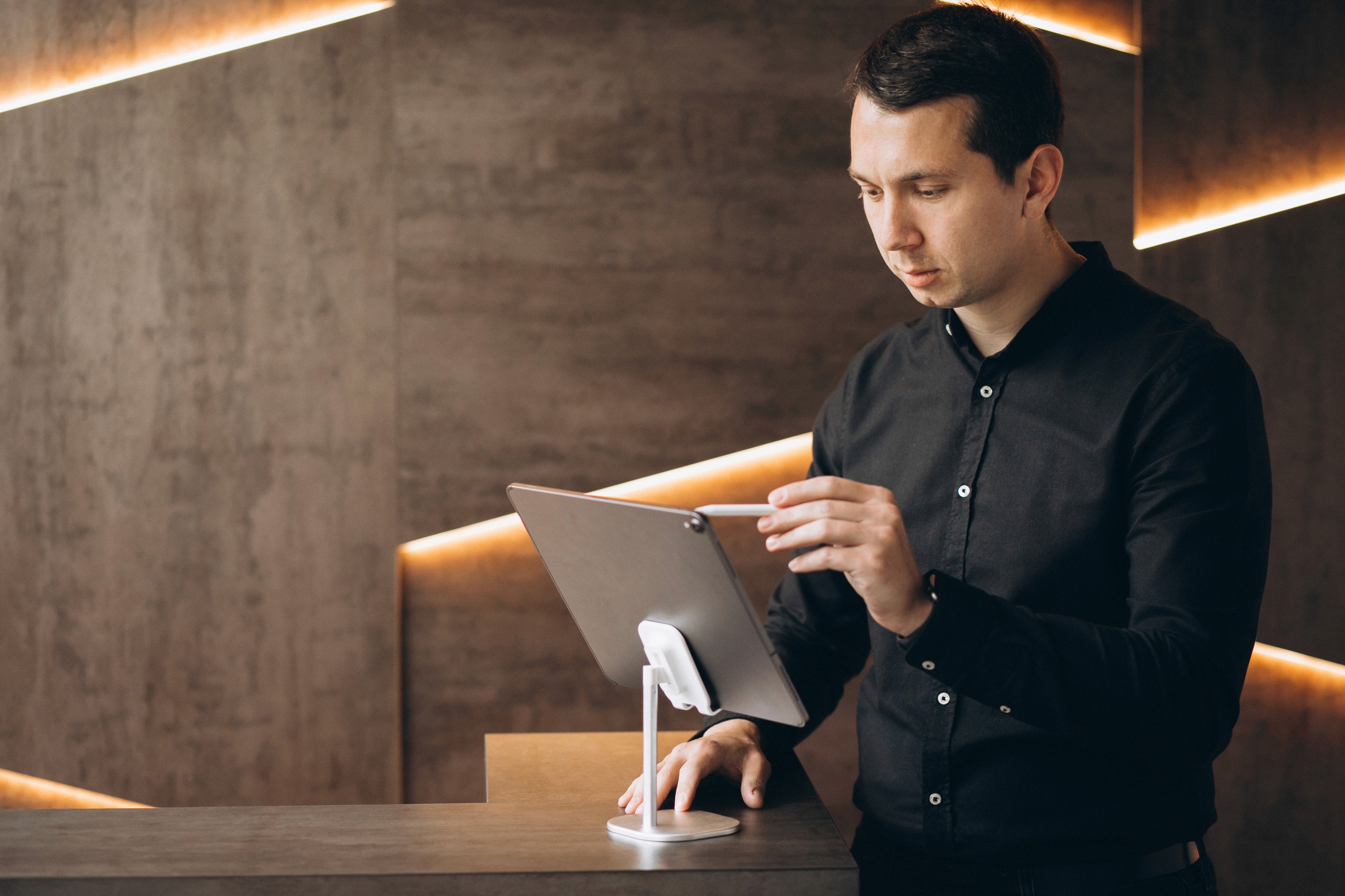 Man working on a laptop at a desk