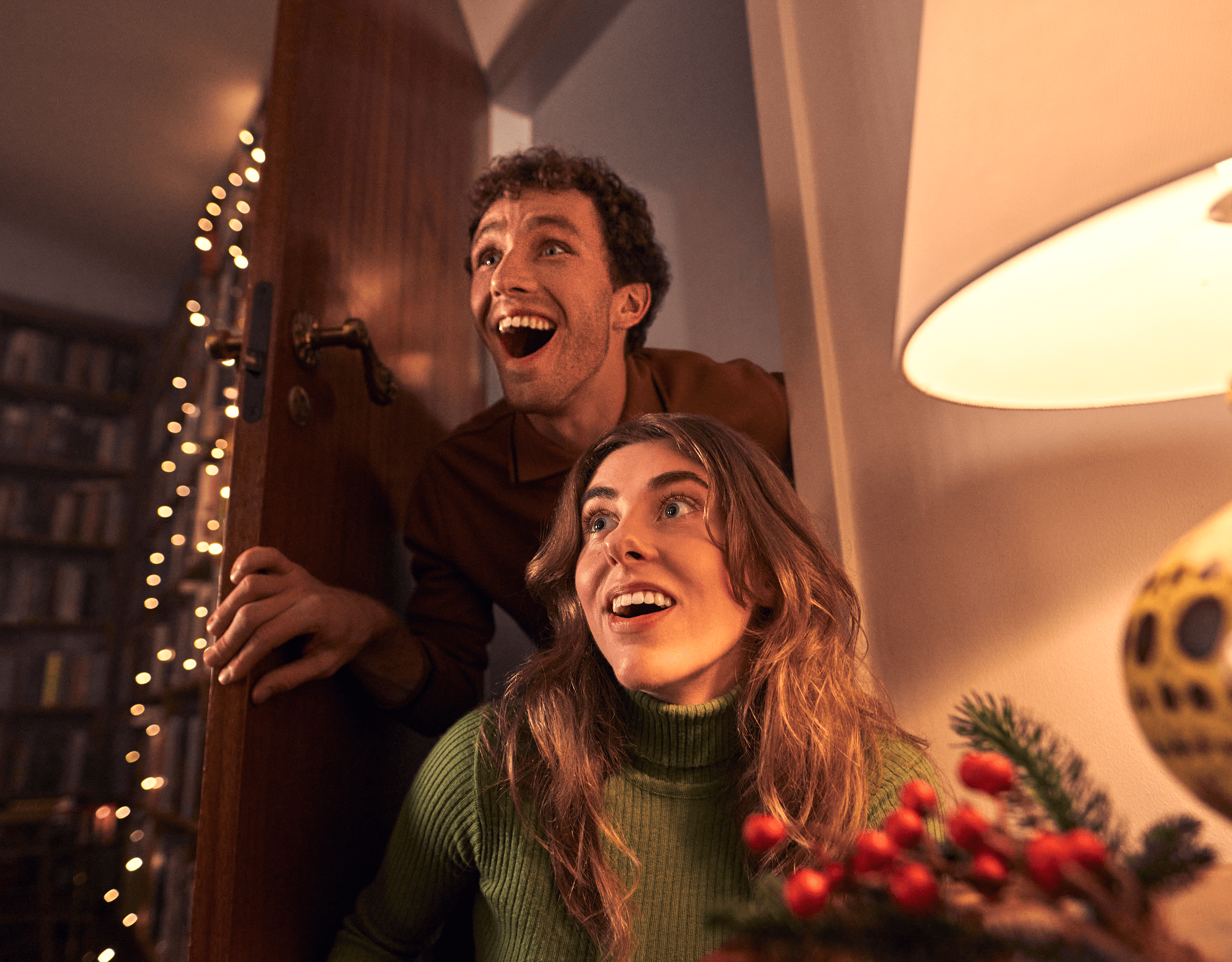 Family members reacting to a Christmas surprise in ALDI’s holiday campaign.