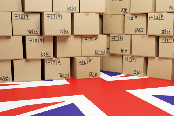 Image of boxes piled up ontop of a union jack flooring