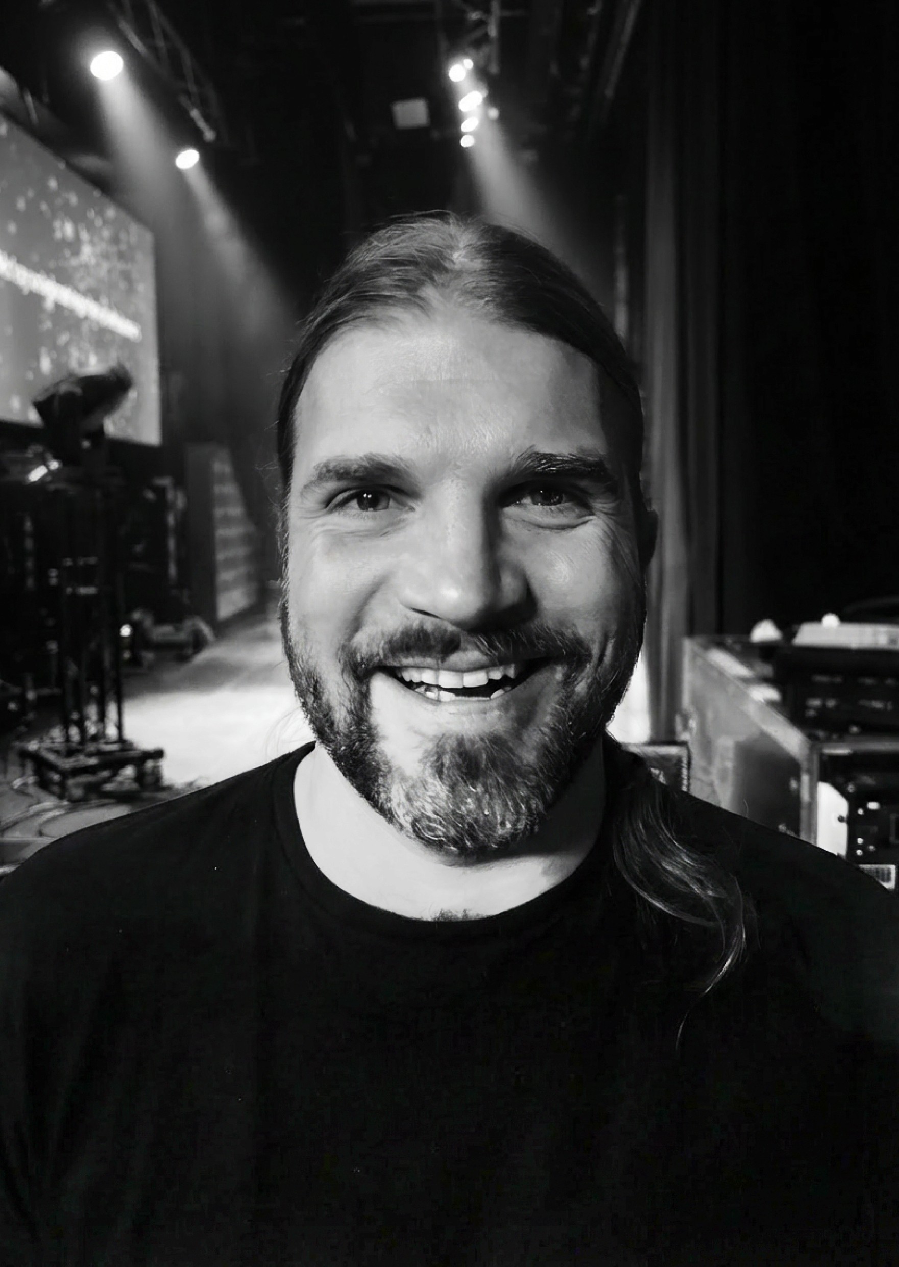 man in gray hoodie wearing black hat