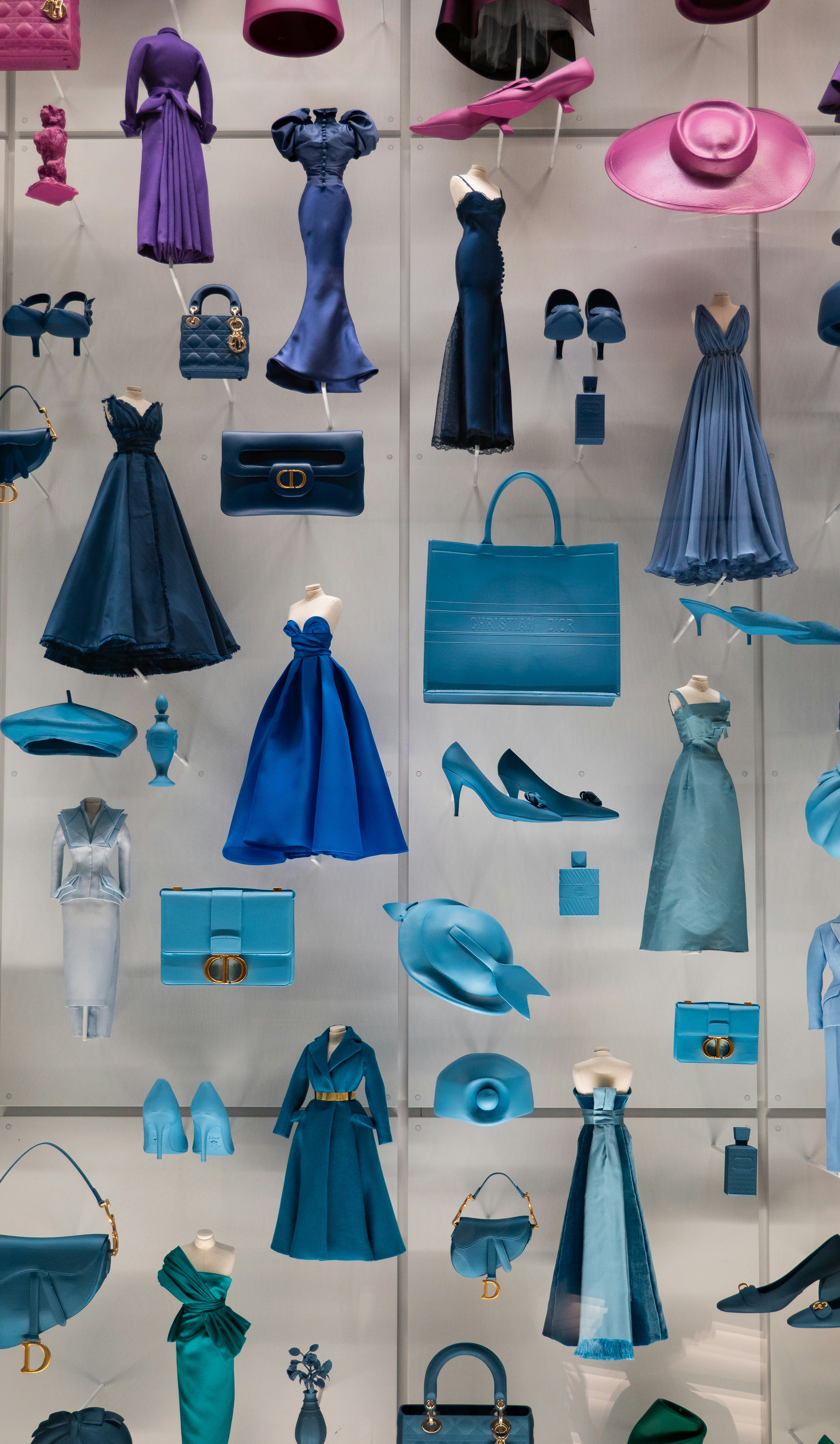 a display case filled with blue and purple items