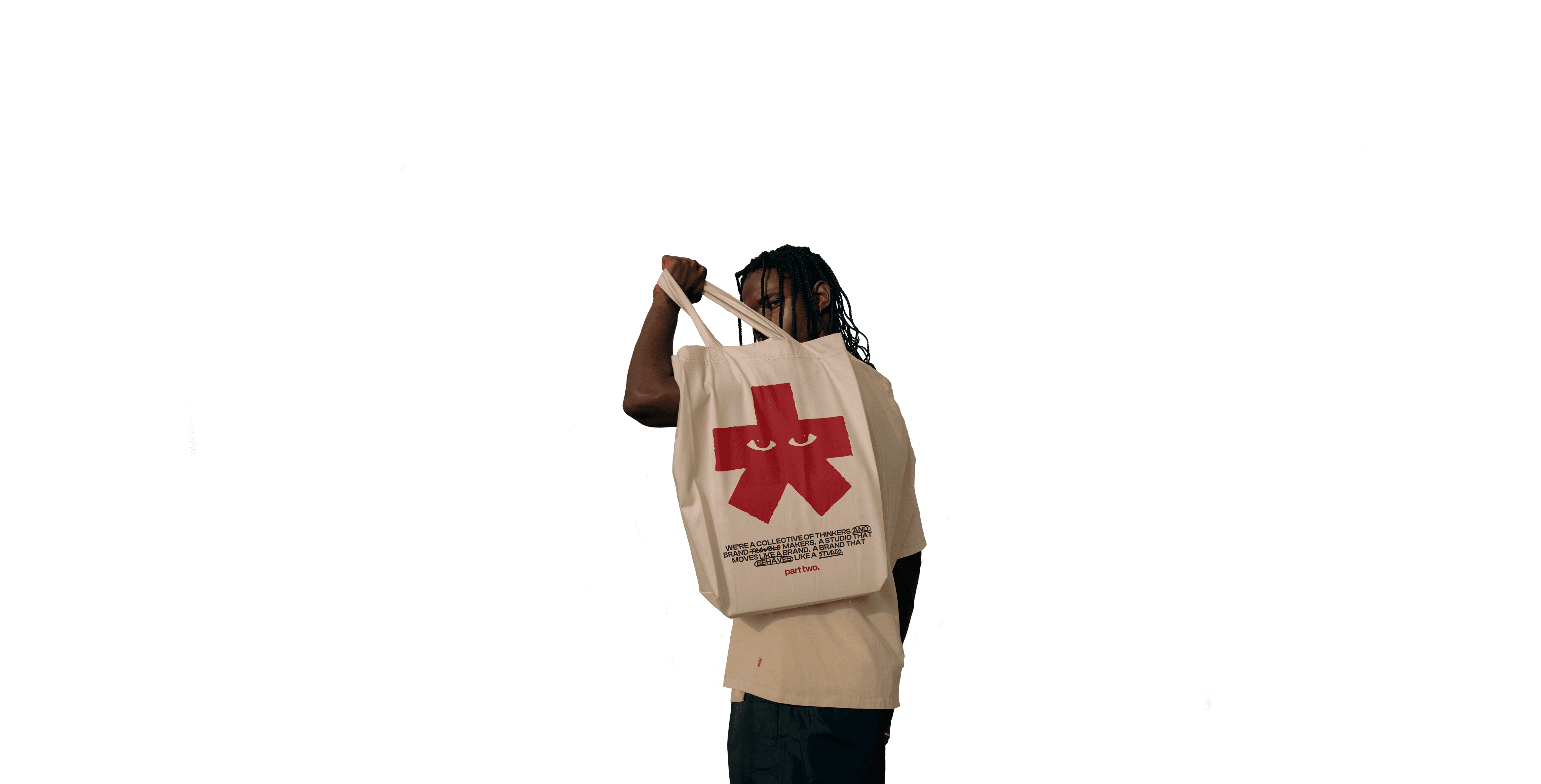 Model holding up a Part Two branded tote bag