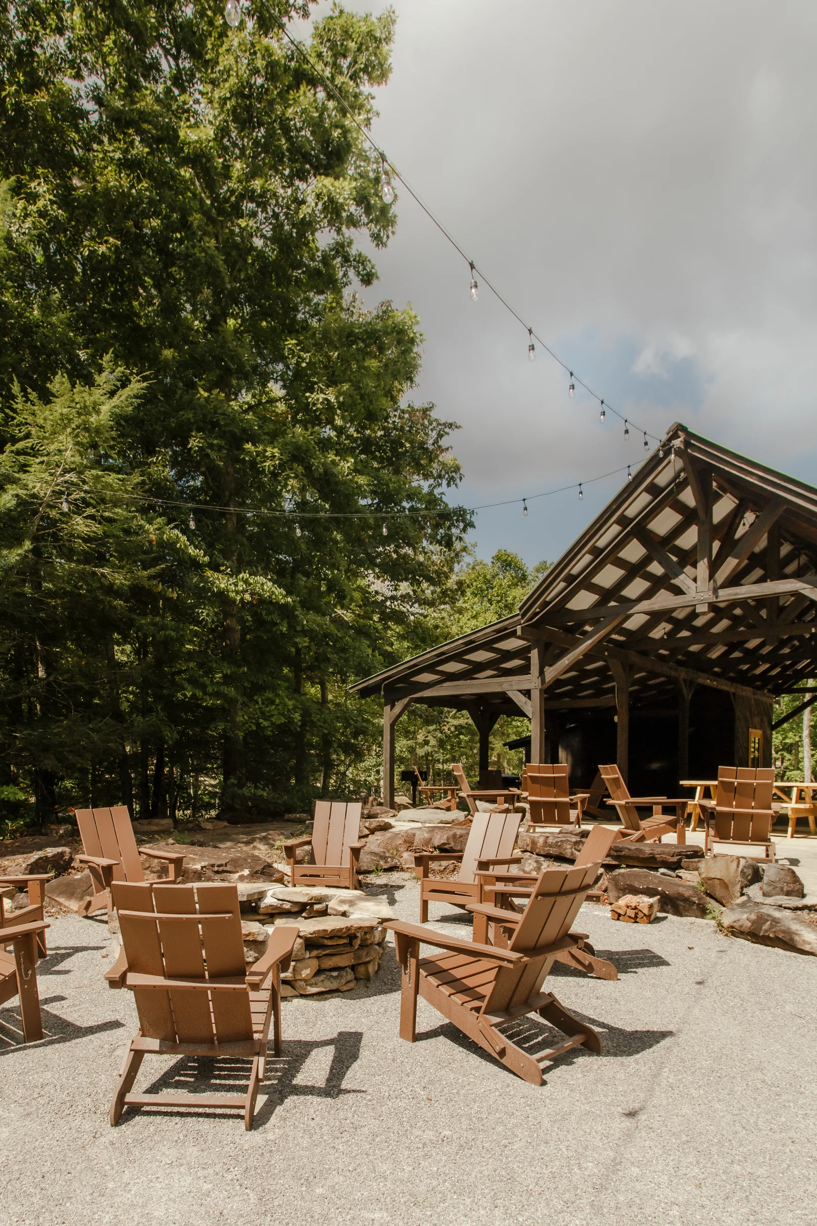 Adirondack chairs around a fire pit