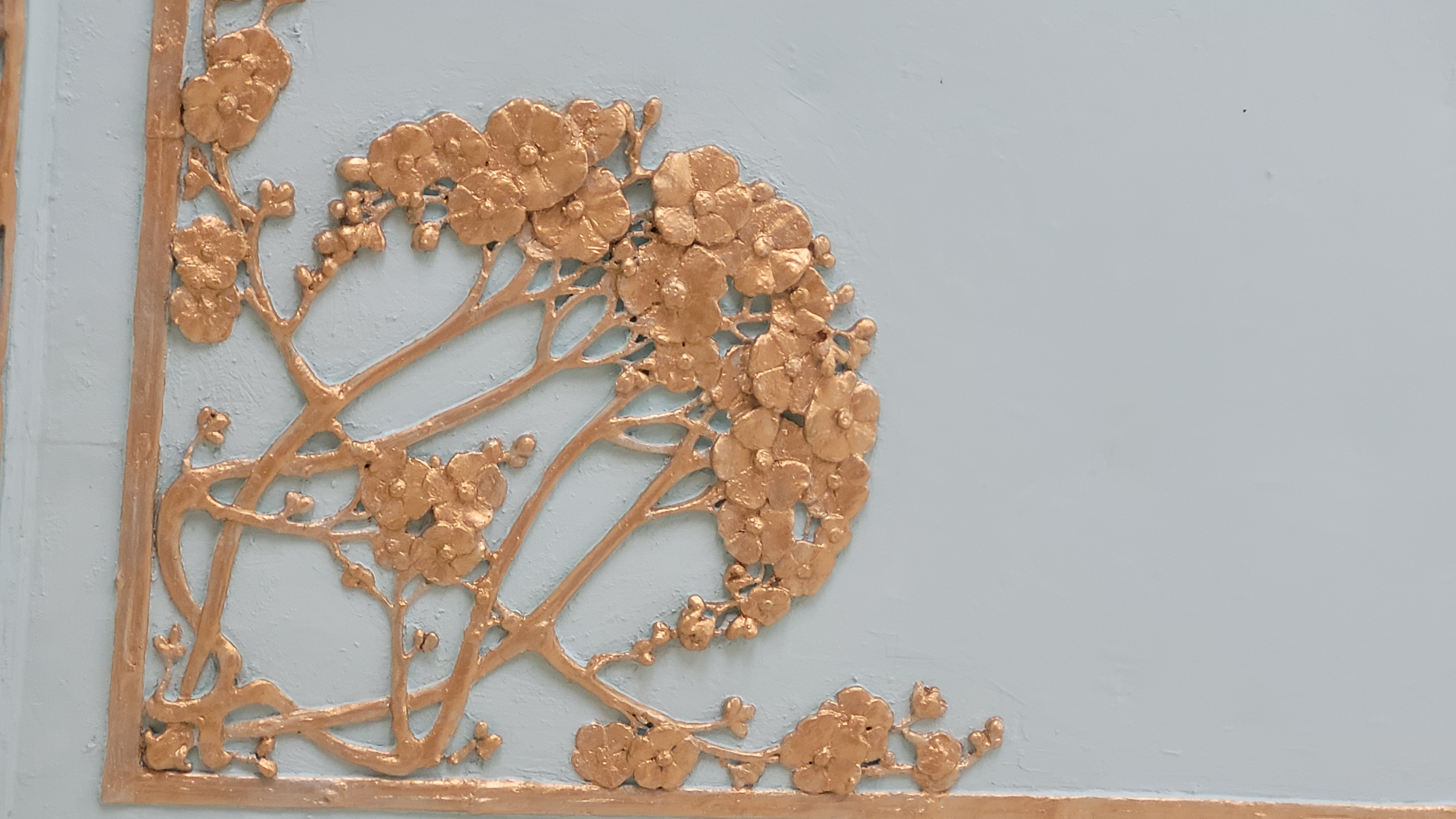 green bush on gray concrete pathway