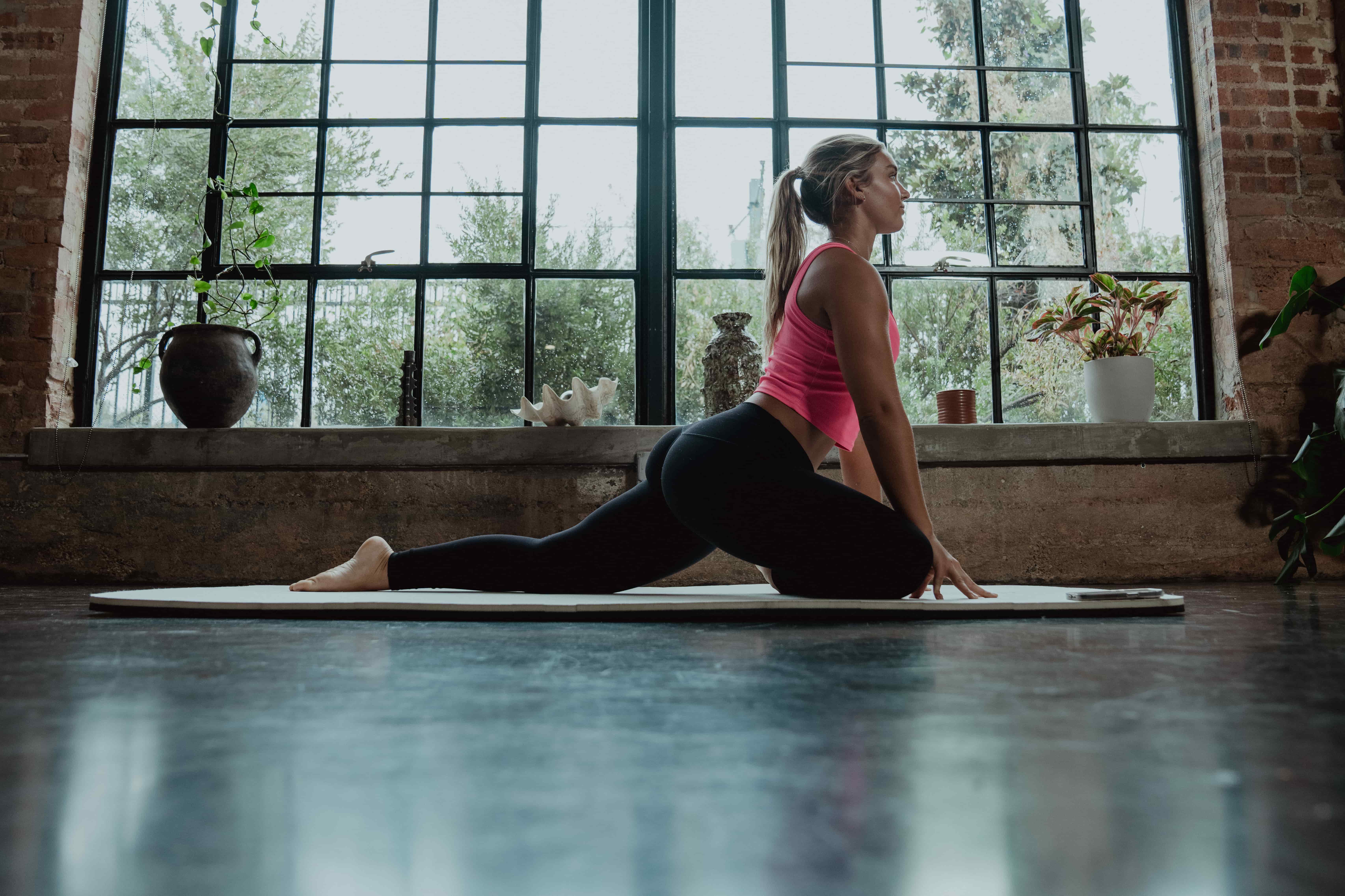 Woman Working out in Home - Back Mobility Exercises