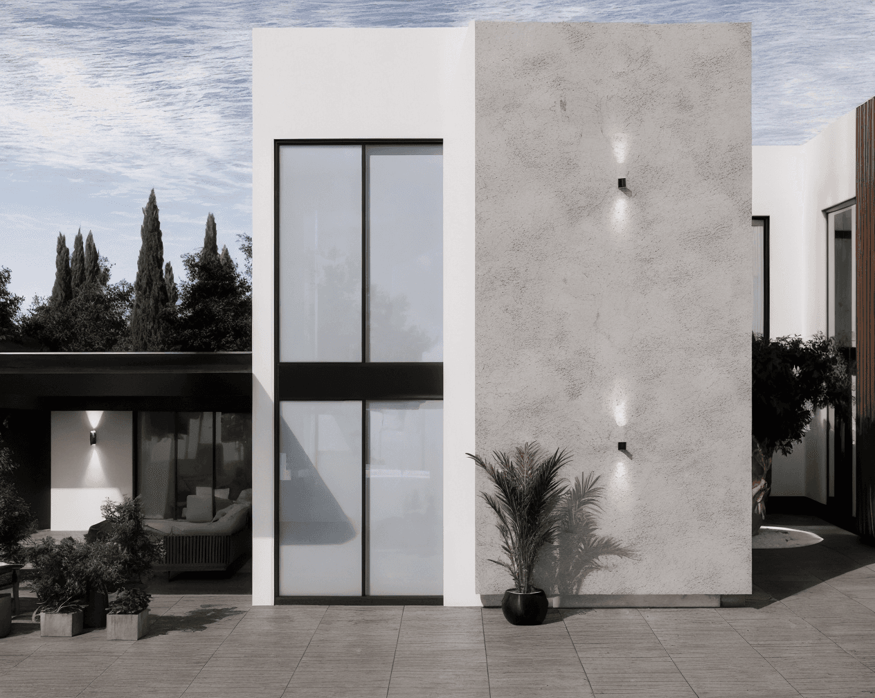 Modern interior entrance with floor-to-ceiling glass walls and warm timber cladding overlooking landscape
