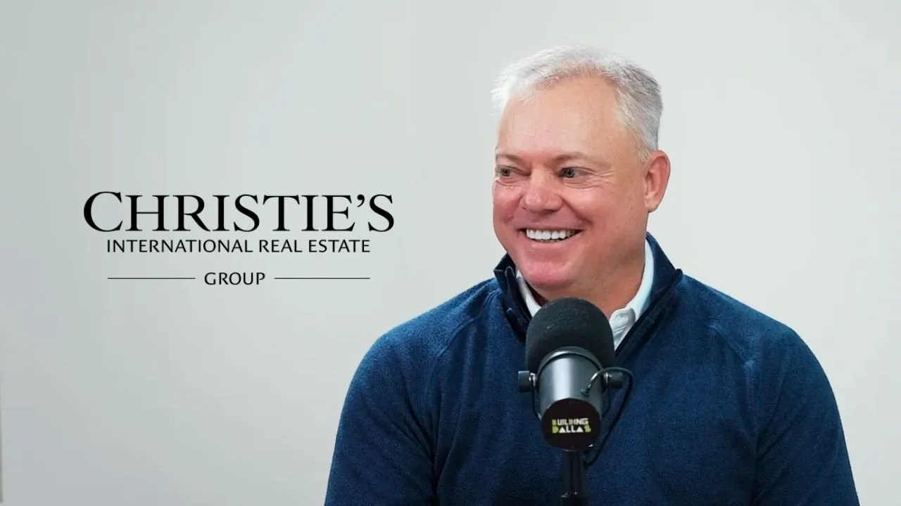 guest speaking into microphones with “Building Dallas” branding