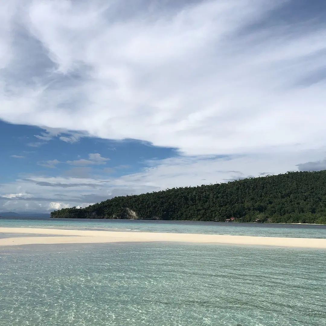 View of sandy beach on the water