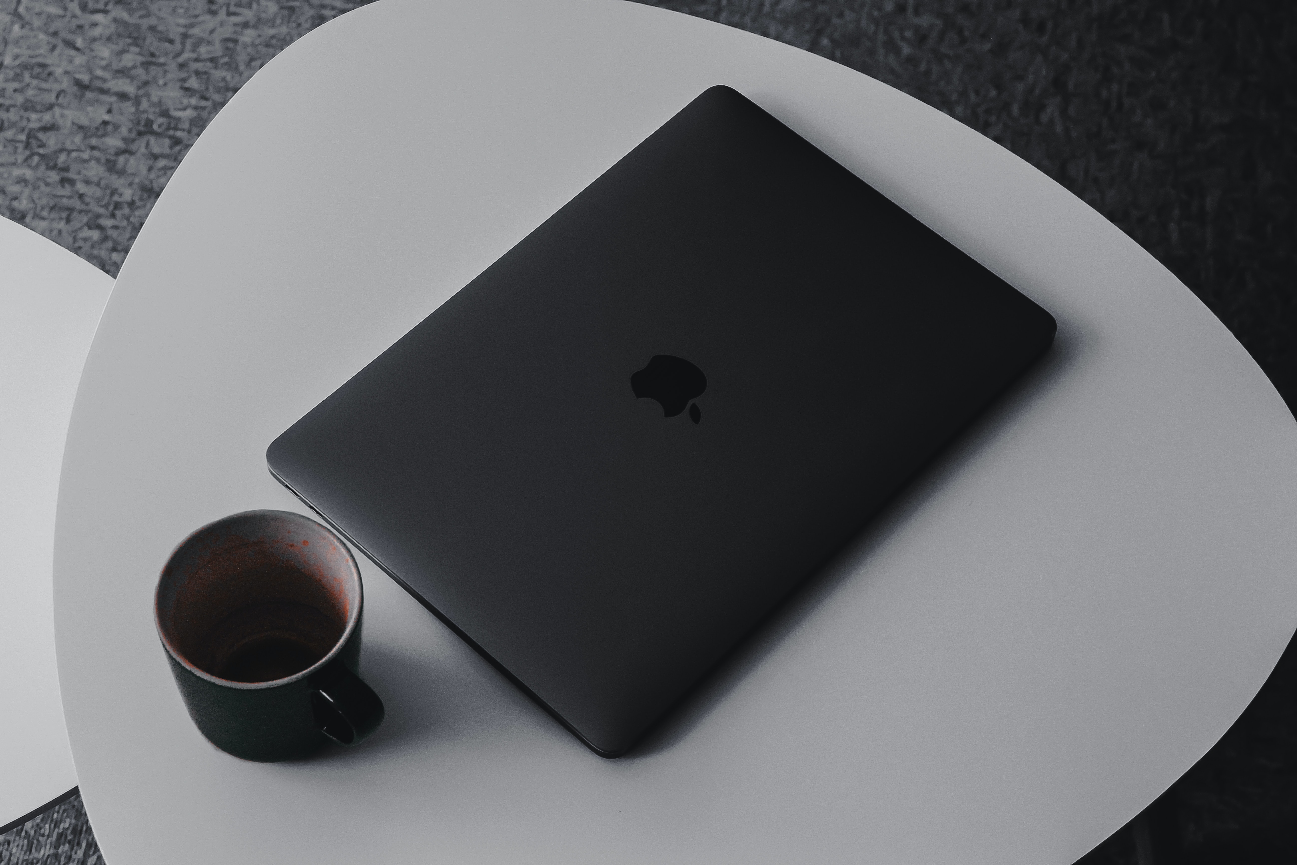 MacBook sitting closed on a table