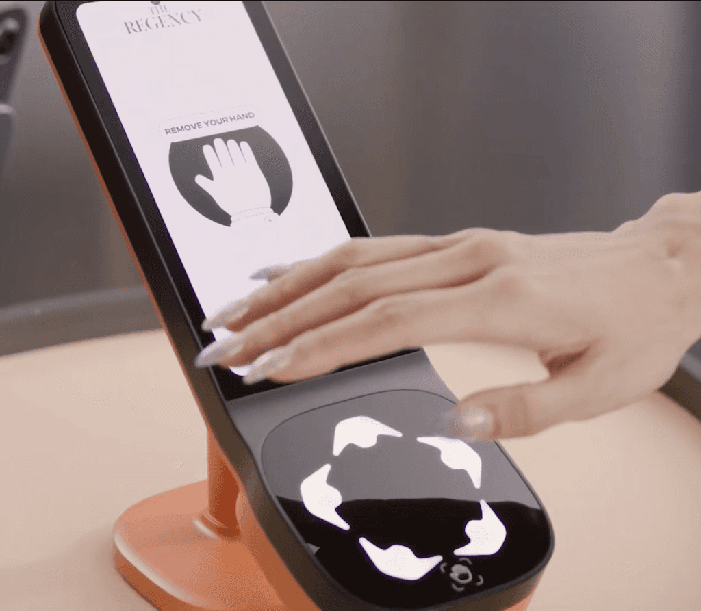 Human hand that touch scanner prototype with humanity protocol logo