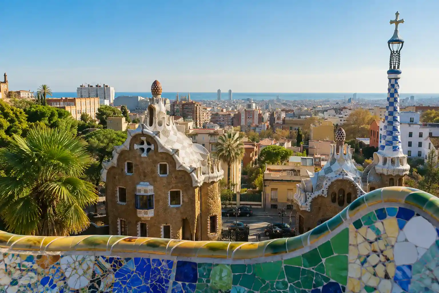 View over Barcelona from Park Güell with the city skyline and Mediterranean Sea in the distance