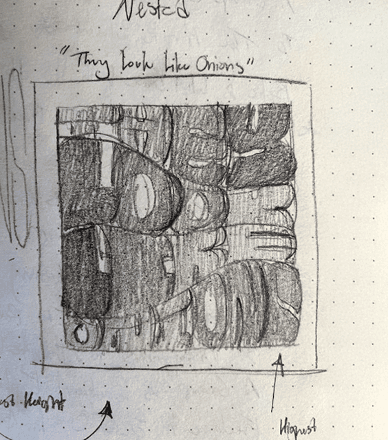 A pencil and paper draft of nested typography reading "they look like onions."