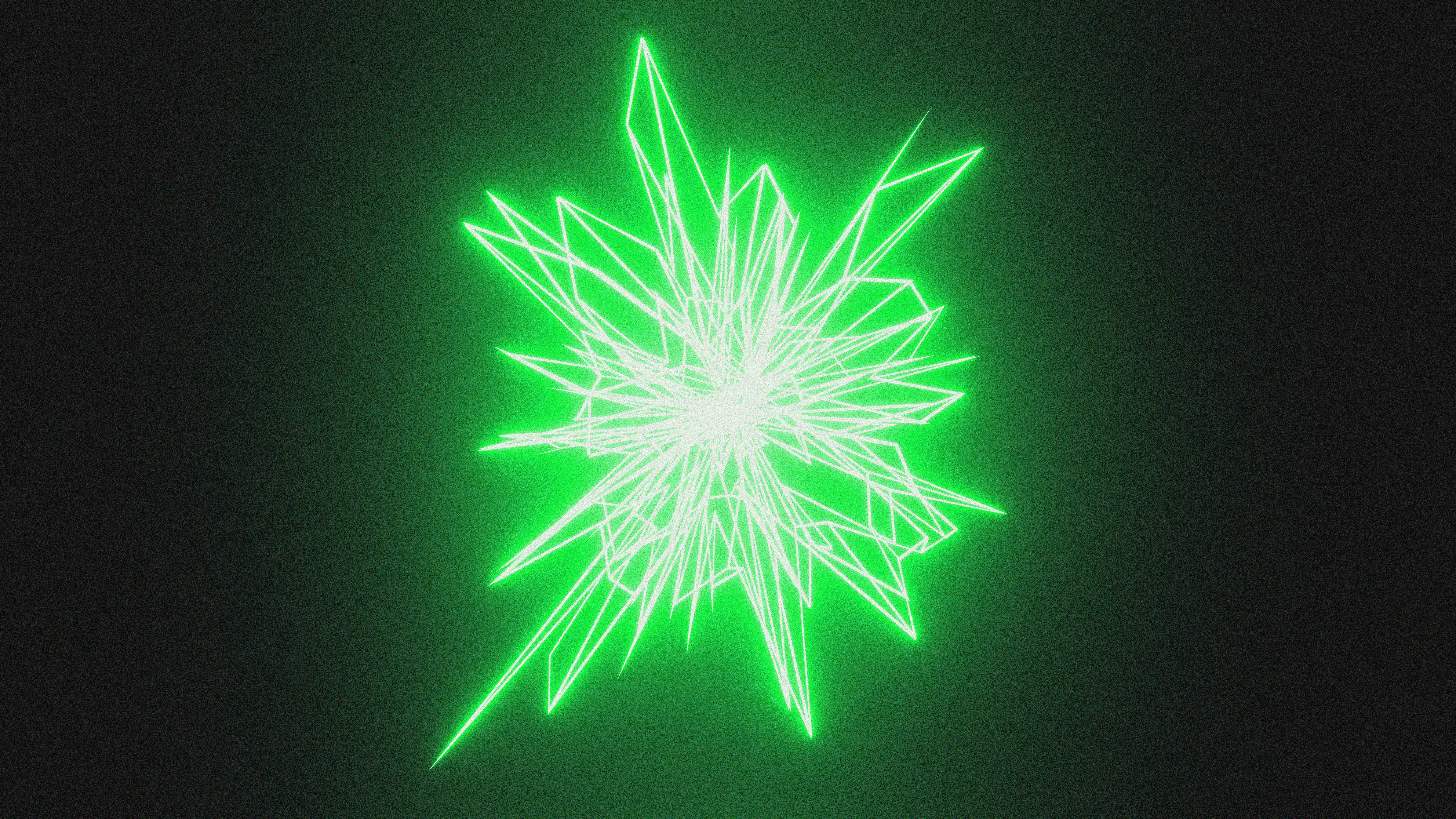 A green and white snowflake on a black background