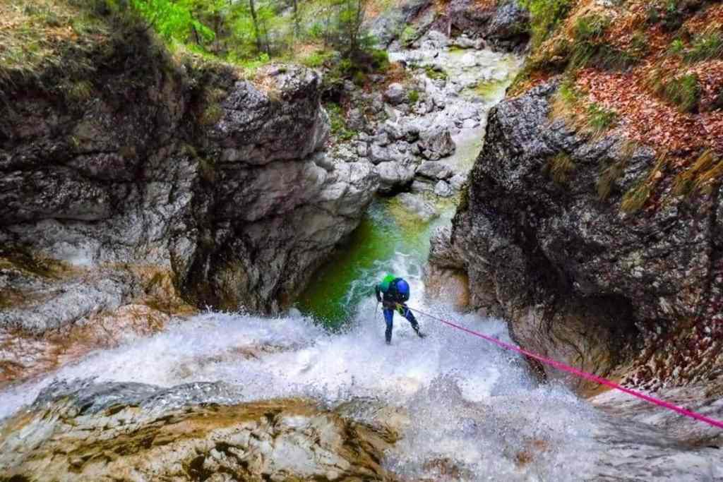 abseiling down a waterfall