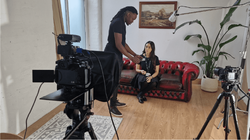 Ben directing an optometrist who is being interviewed.