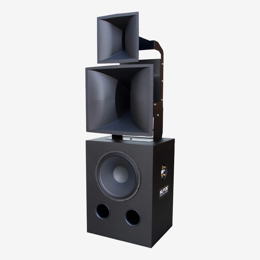Black speaker cabinet with sub-woofer and two horn-shaped tweeters.