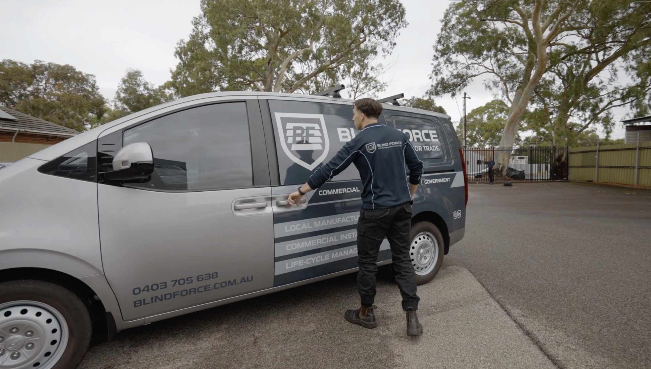 Blind Force team opening work van on site to unload tools and equipment