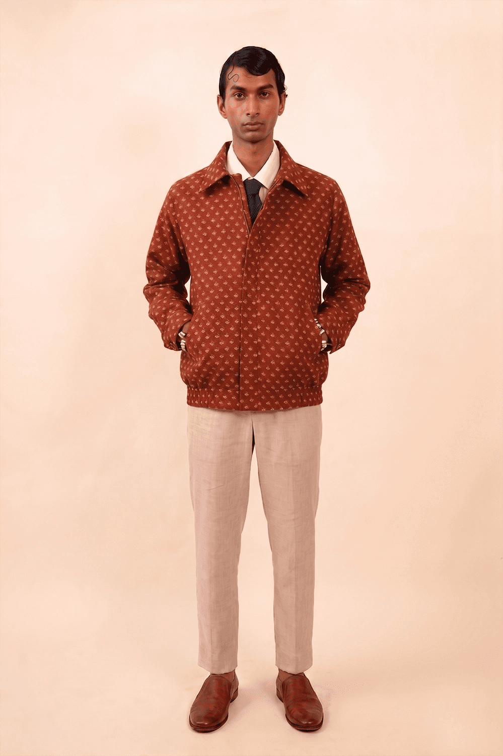 AKSA Bomber I is our printed silk bomber jacket, handcrafted by skilled artisans in-house using two one-of-a-kind vintage silk saree. 