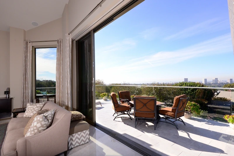 Harbor Ridge Transitional Remodel with an outdoor patio offering expansive city and sky views.