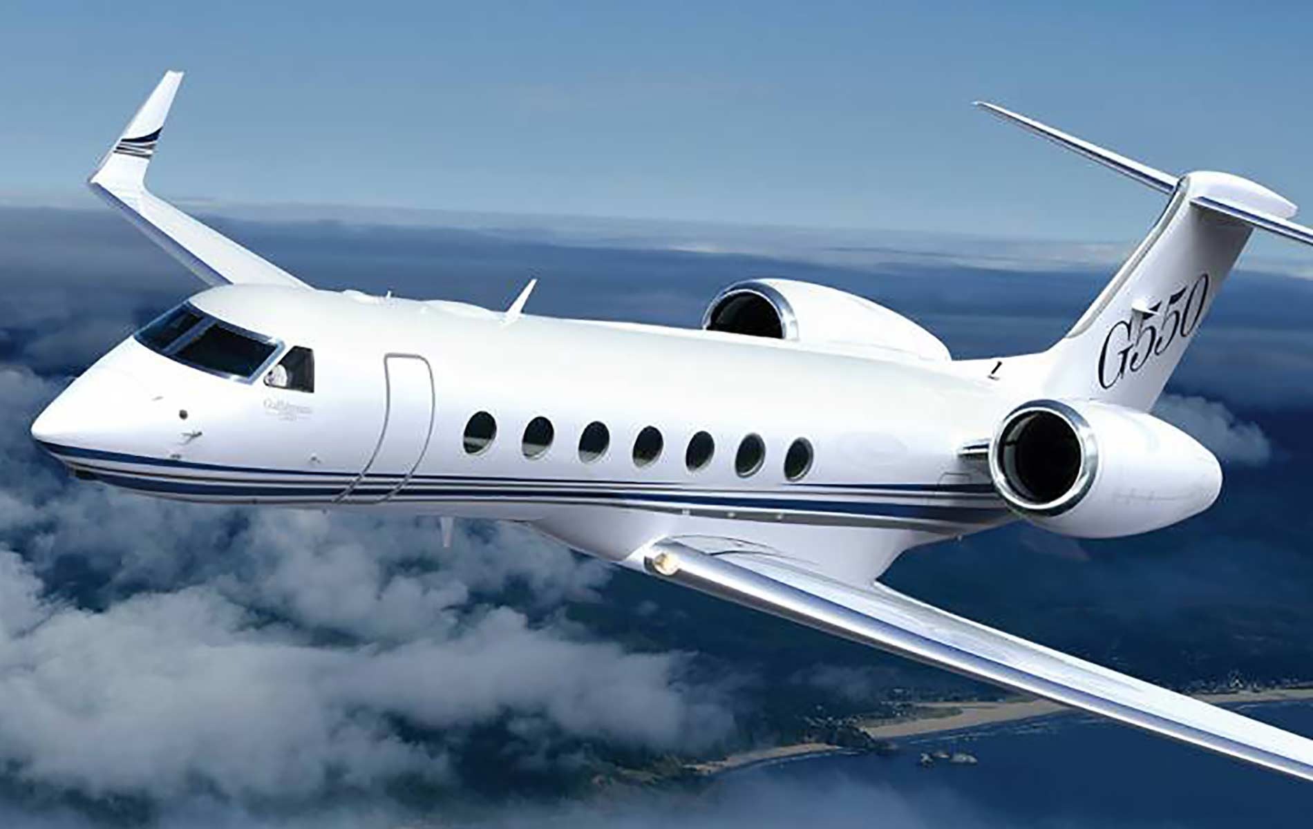 The Gulfstream G550 is a long-range business jet produced by Gulfstream Aerospace.      It has a range of 6,750 nautical miles (12,501 km) and can accommodate up to 19 passengers.      The G550 has a spacious cabin with stand-up headroom, a full-service galley, and a large lavatory. It is powered by two Rolls-Royce BR710 turbofan engines and has a maximum cruising speed of Mach 0.87. The G550 features an advanced avionics suite with four large liquid crystal displays, a dual digital autopilot system, and an enhanced vision system.   