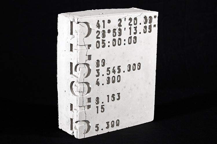 The image displays four open books arranged in a 2x2 grid against a black background. Each book features a red spine and contains a combination of text and photographs, highlighting themes related to the Gezi Park protests in Istanbul, Turkey. Various pages showcase crowd scenes, personal reflections, and significant symbols, emphasizing the book's focus on storytelling and commemoration.