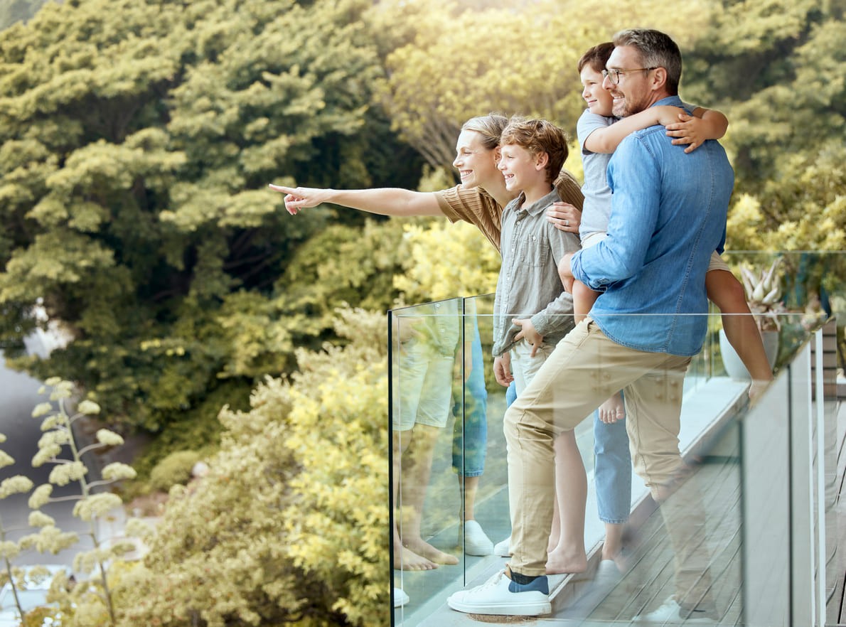 Expatriate family viewing a premium property near Barcelona, capturing the excitement of finding a new luxury home in the Maresme region.
