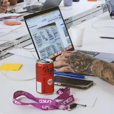 Man at a computer during the Crazy 8's dynamic.
