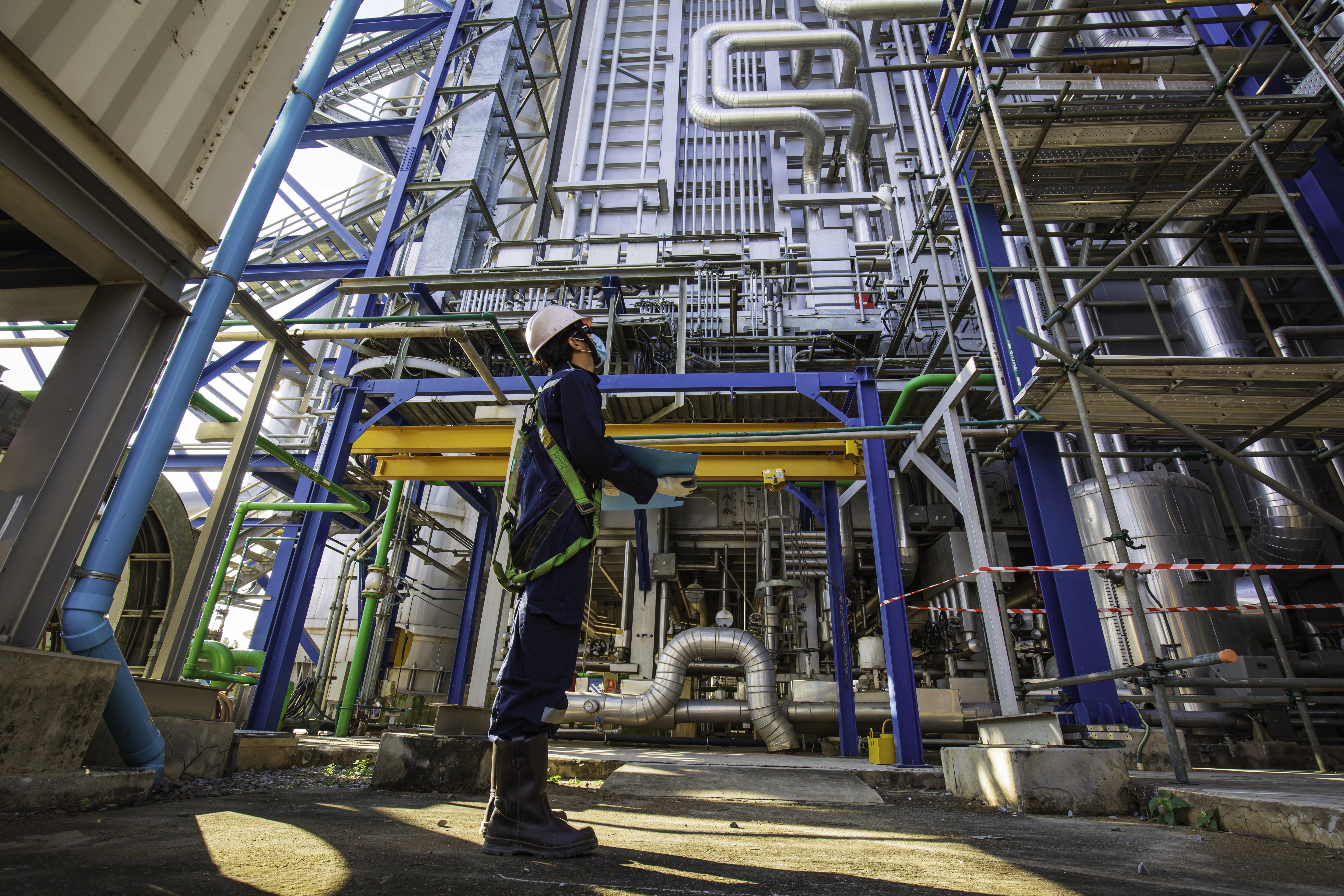 An orange cube-shaped side table is shown.