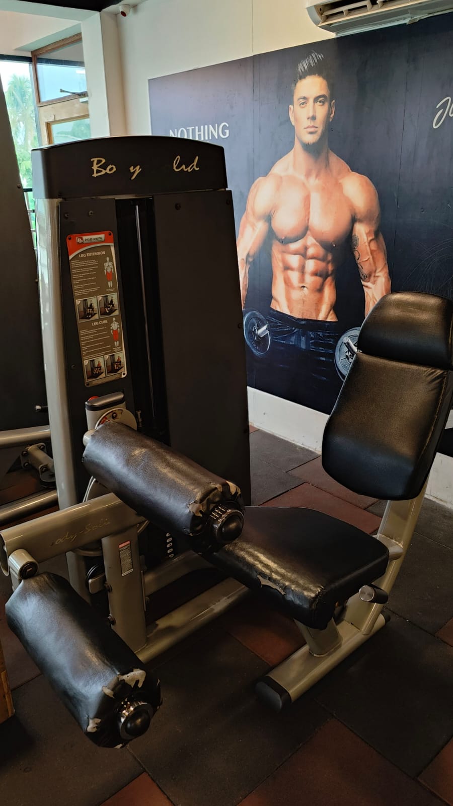 A man working out by using punching bags 