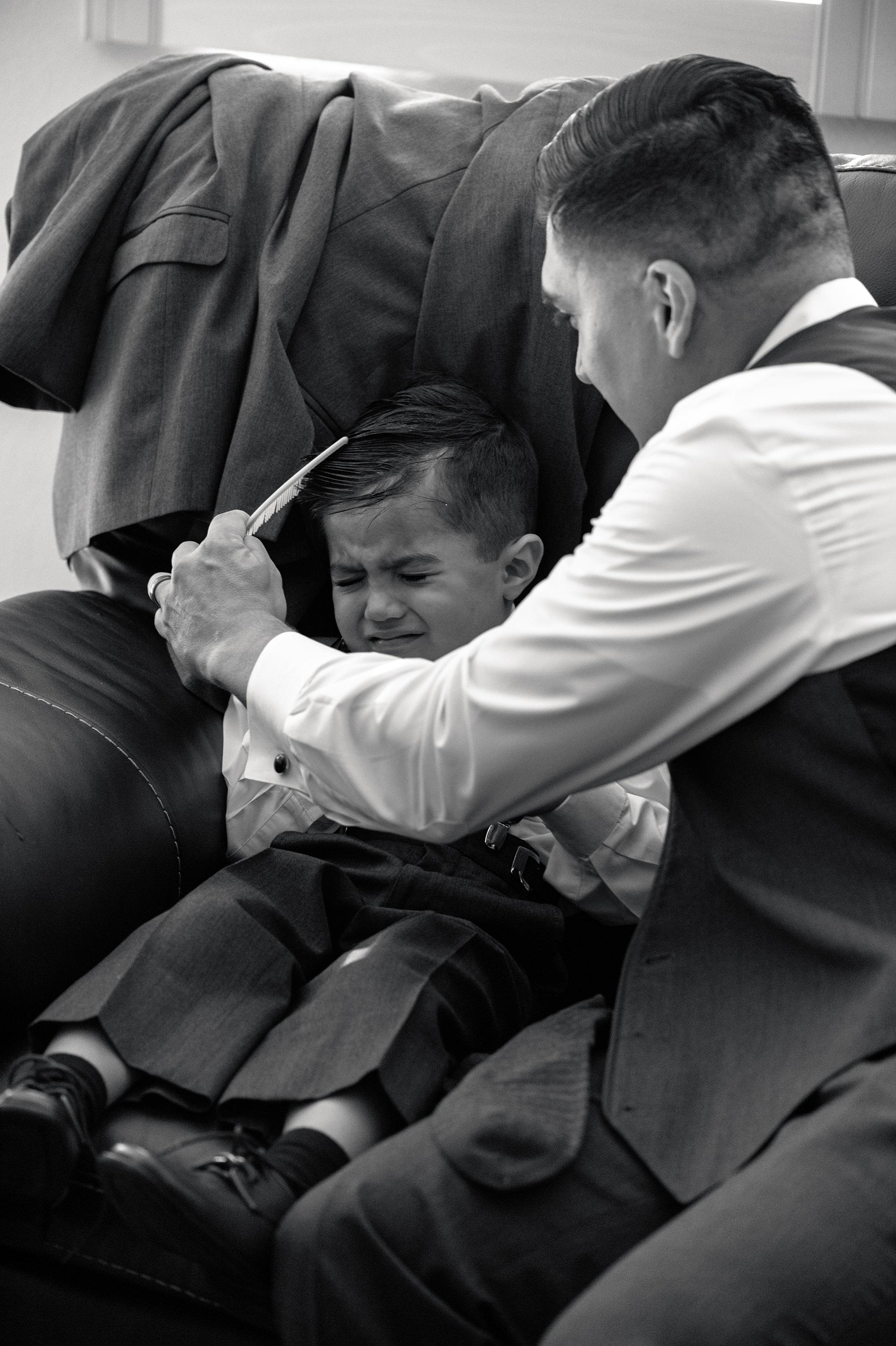 Flat lay wedding details with bouquet, rings, and sparkling bridal heels