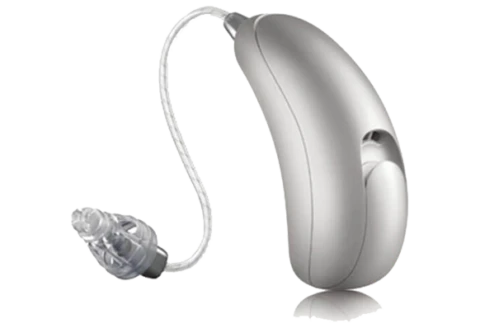 A sleek, silver modern earring design with a curved shape and a small, matching stud earring beside it.  Modern Hearing Aid