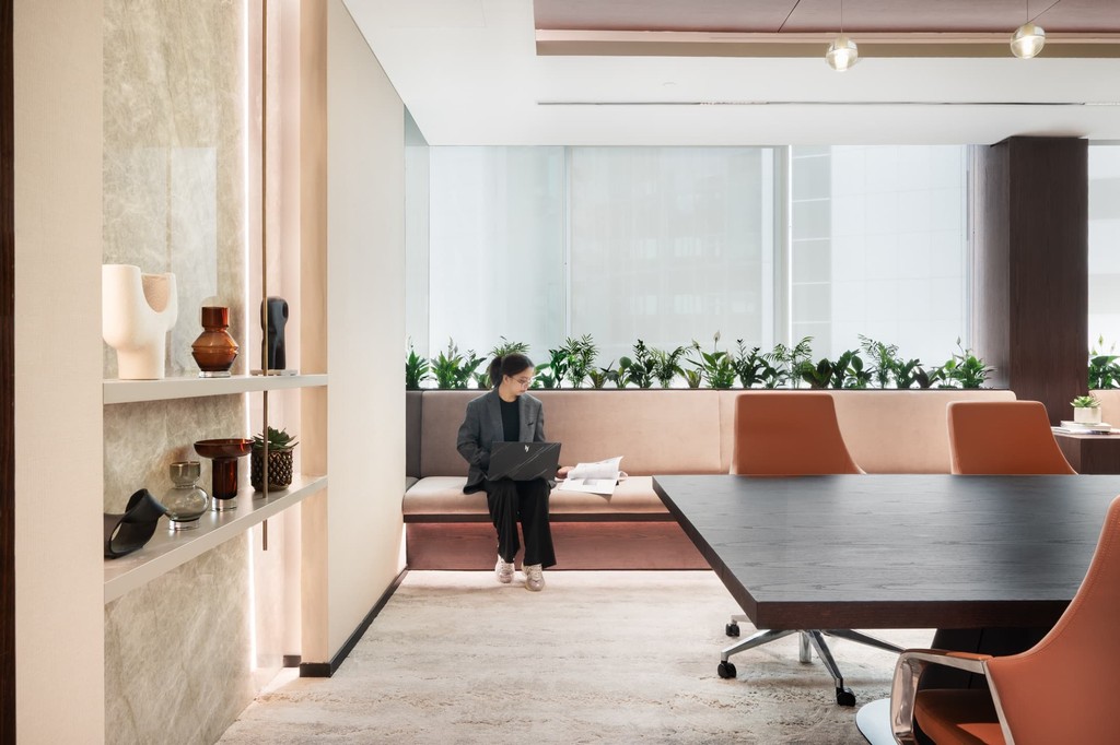 Executive private office with floor-to-ceiling windows and modern furniture in serviced offices dubai.