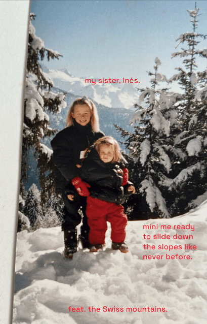 Two children in the snow in the mountains