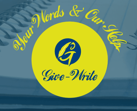 a man with a goatee smiles at the camera