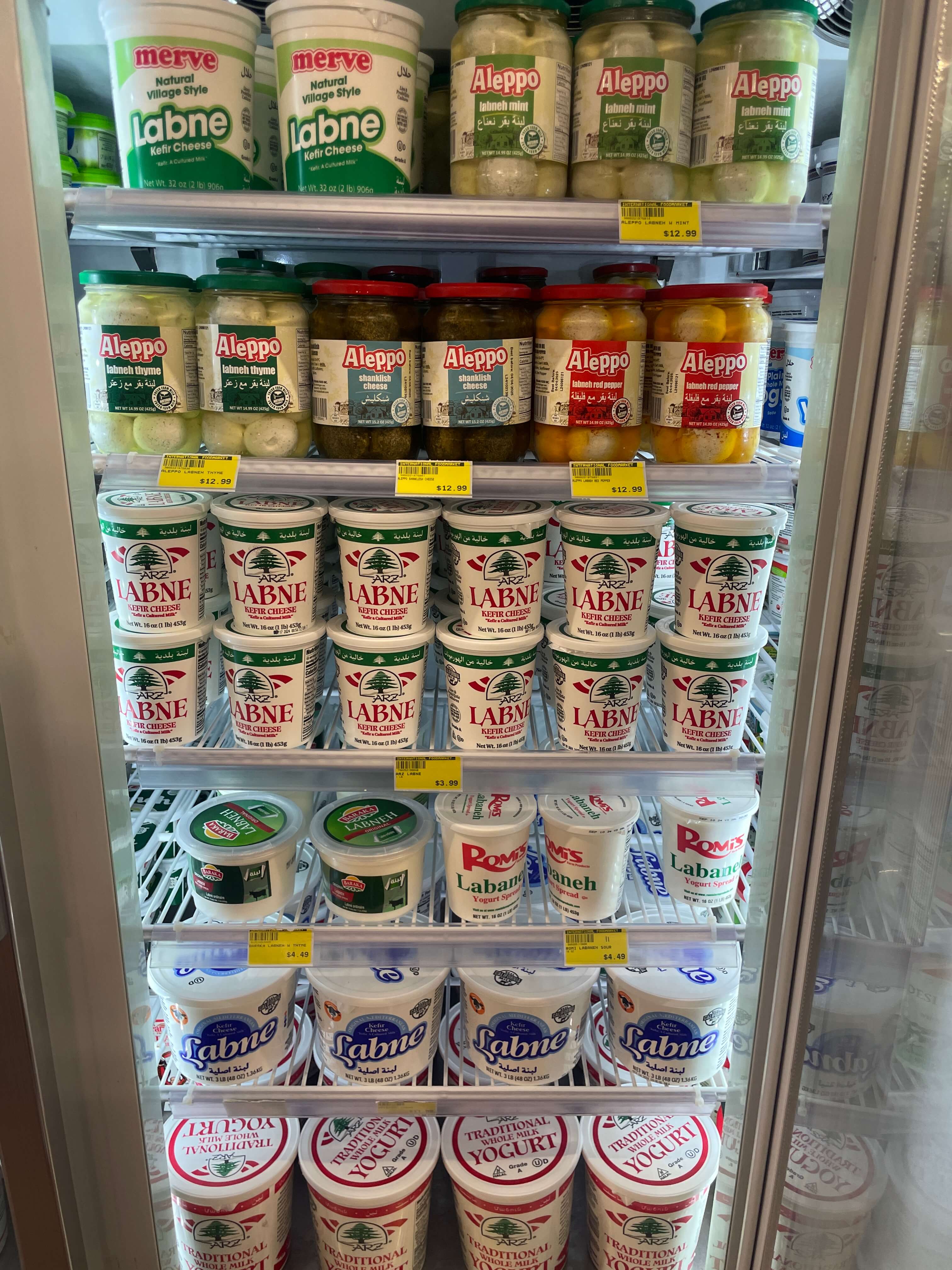 Variety of Greek yogurt and labneh products at International Food Market Orlando.