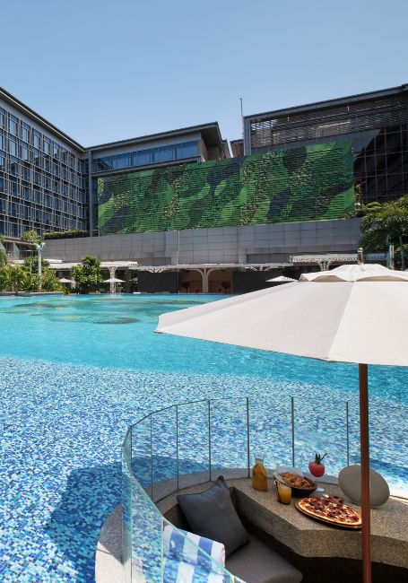 Poolside perspective of the shared pool area at Hilton Hotel Manilla