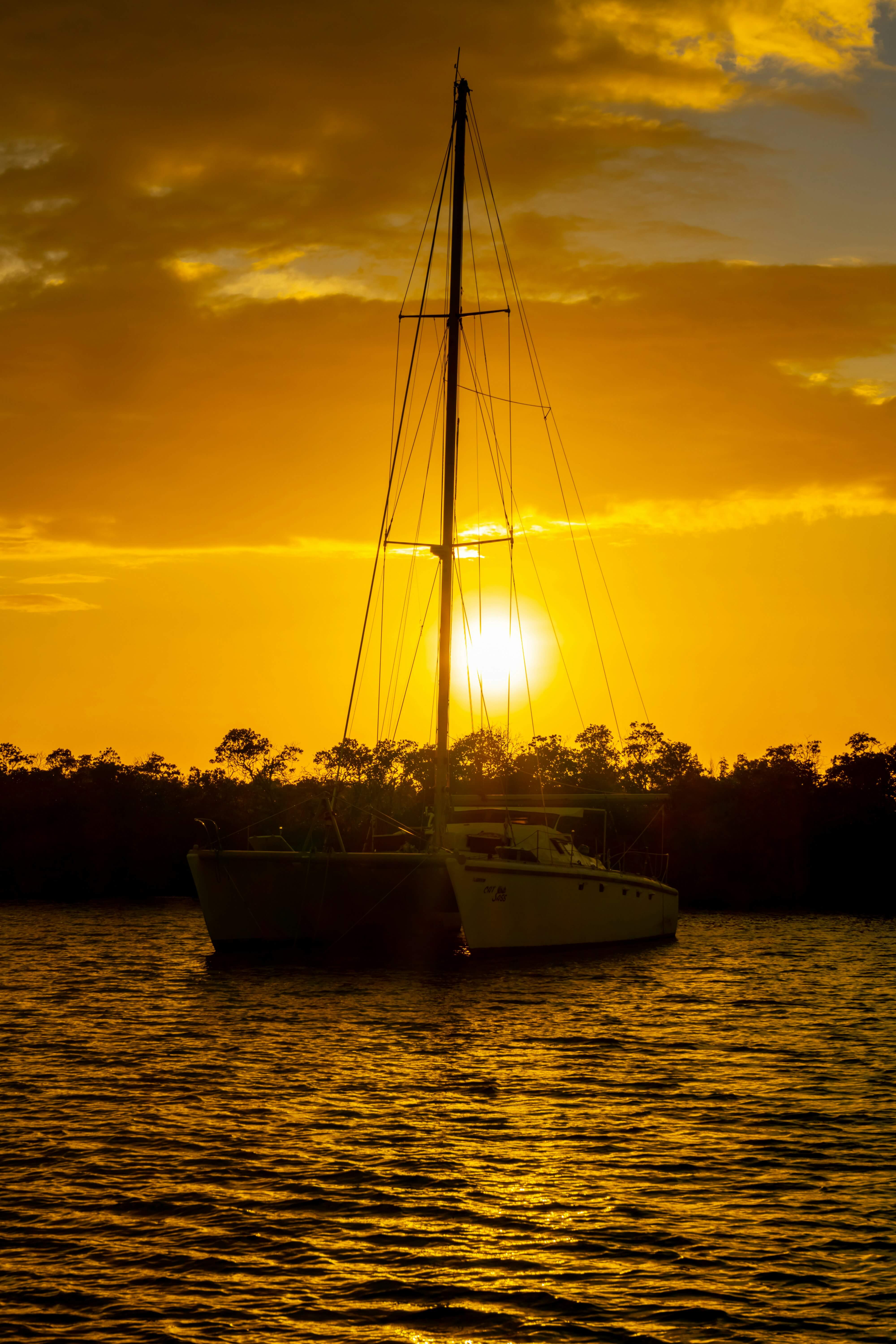 Sailboat on the water at sunset near Club Vieques, offering a peaceful and scenic view of the Caribbean coast.