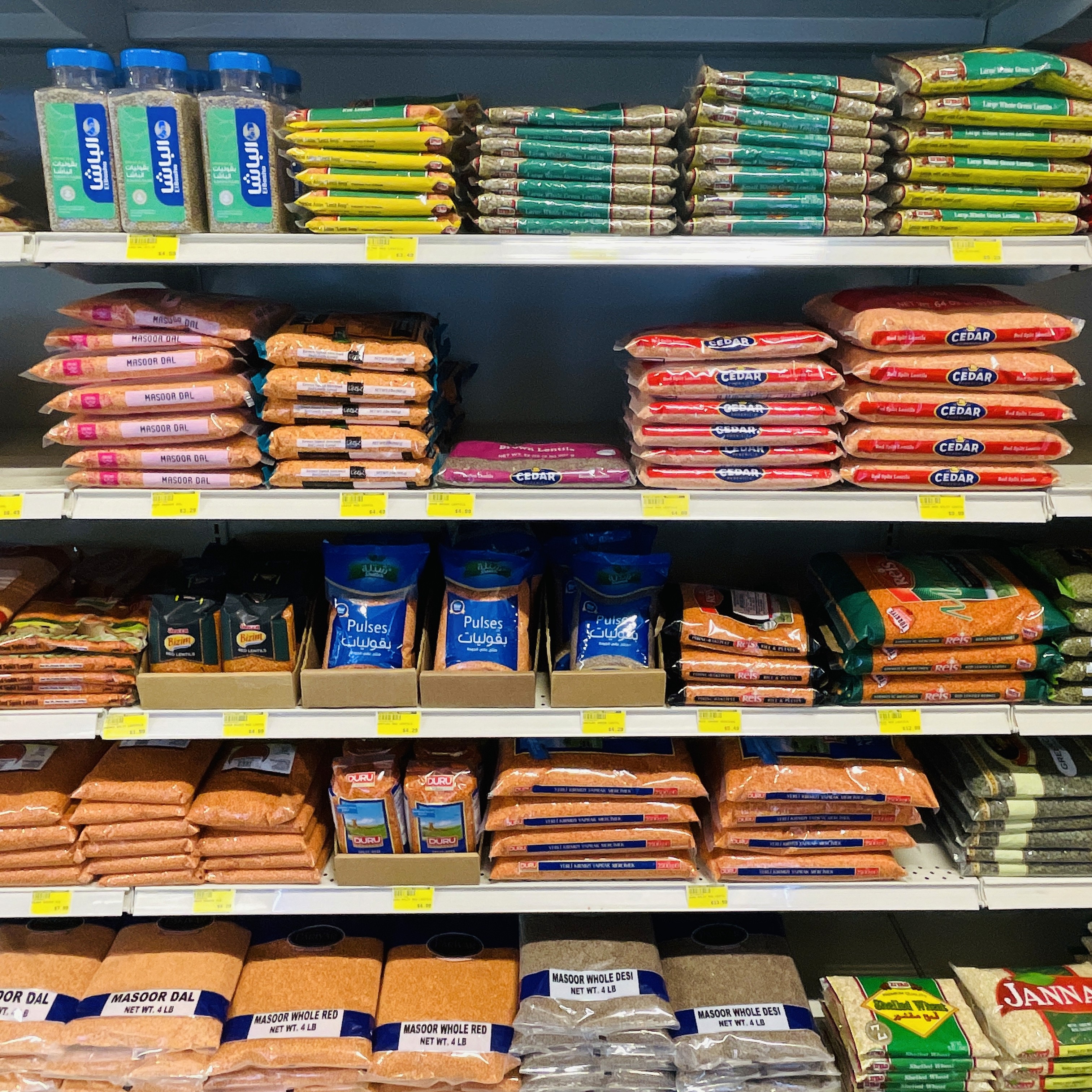 Various types of split peas, lentils, and pulses on display at International Food Market Orlando.