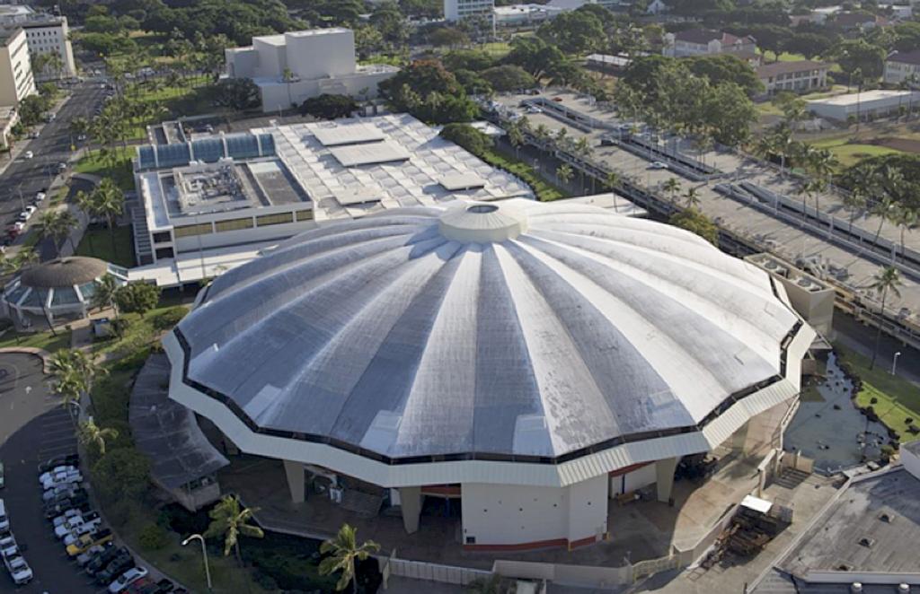 a building with trees and plants