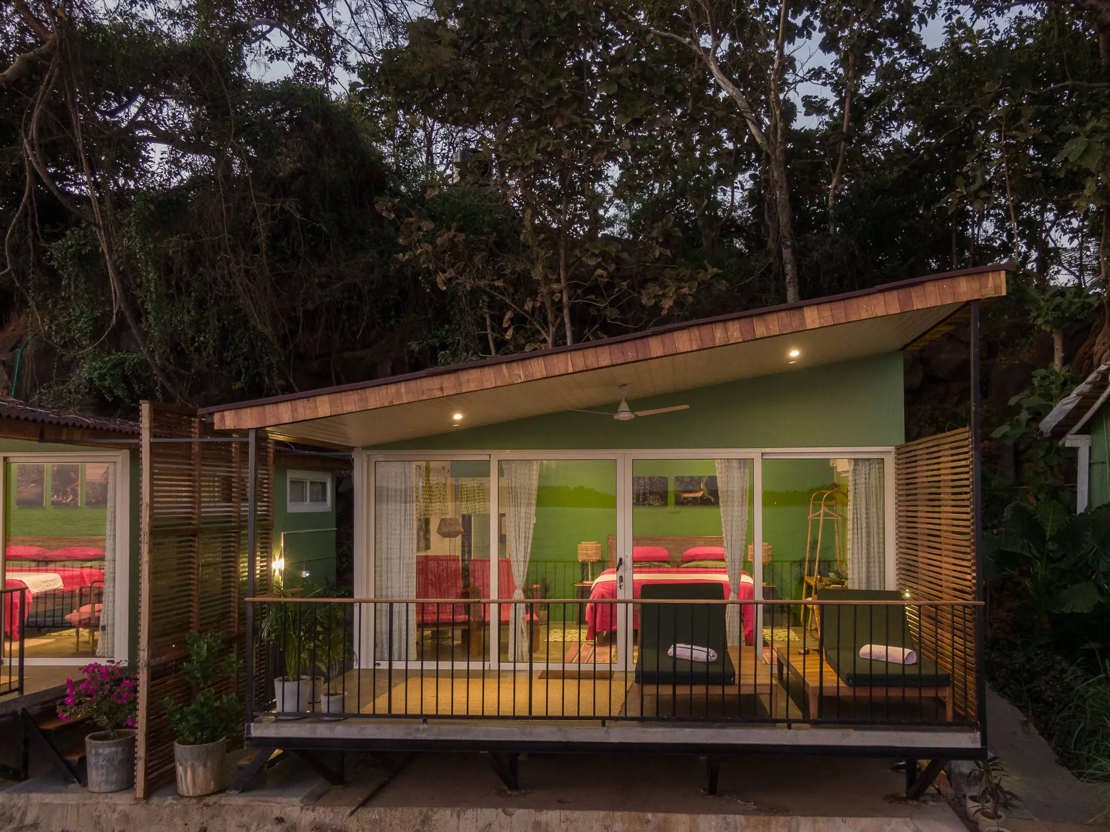 Grand Sea View Room 8 at Casa Jaali — the elevated cabin at dusk