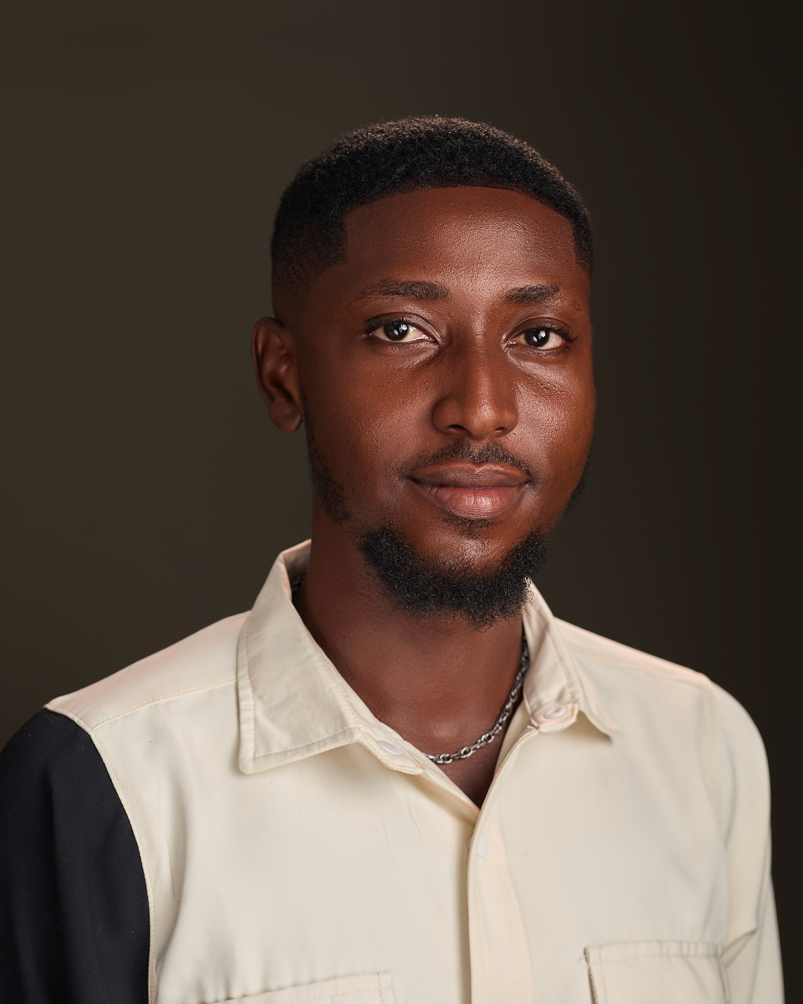 person sitting in a chair in front of a man