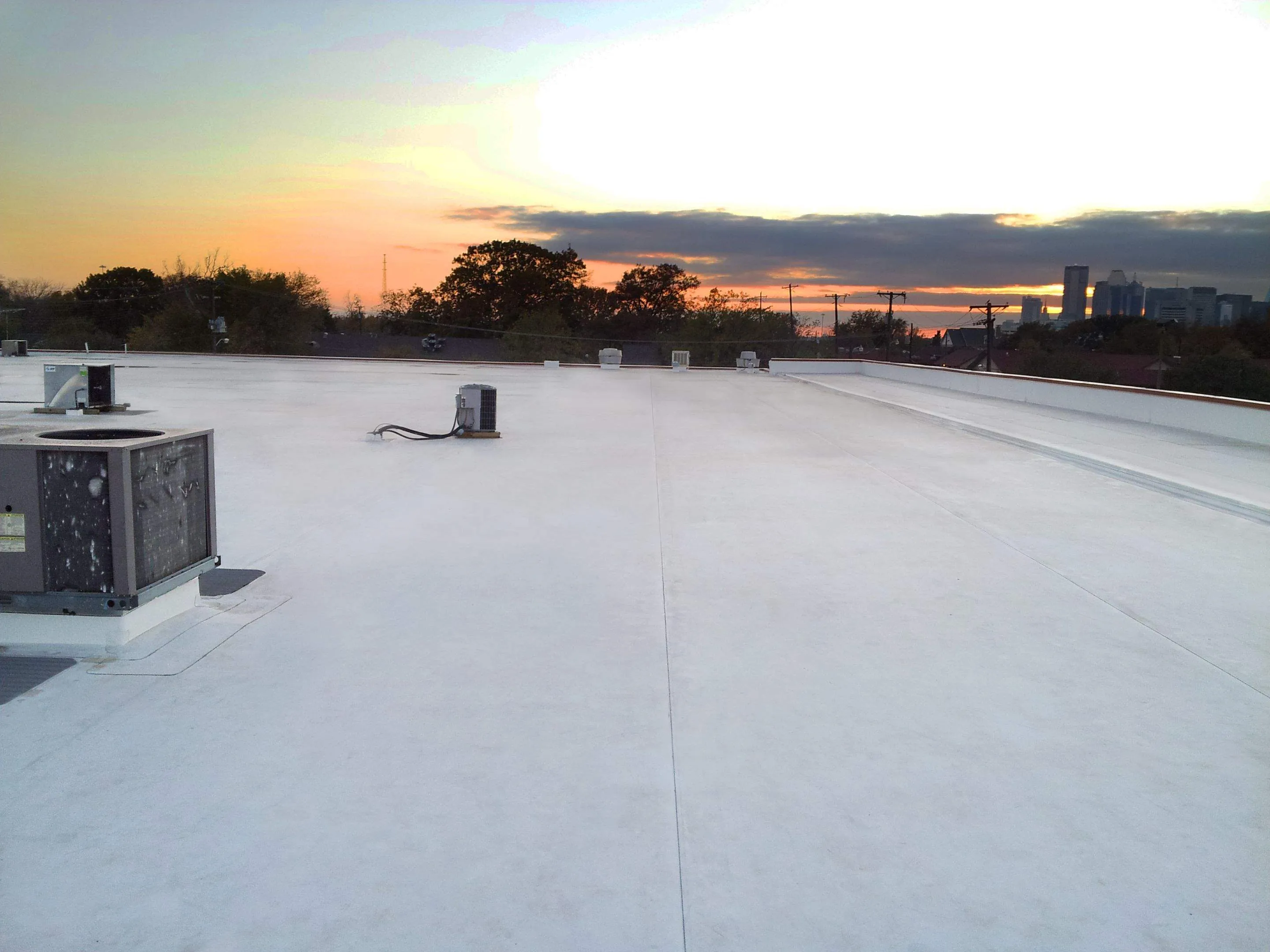 Commercial roofing hail dammage assesment after hail storm in dallas.