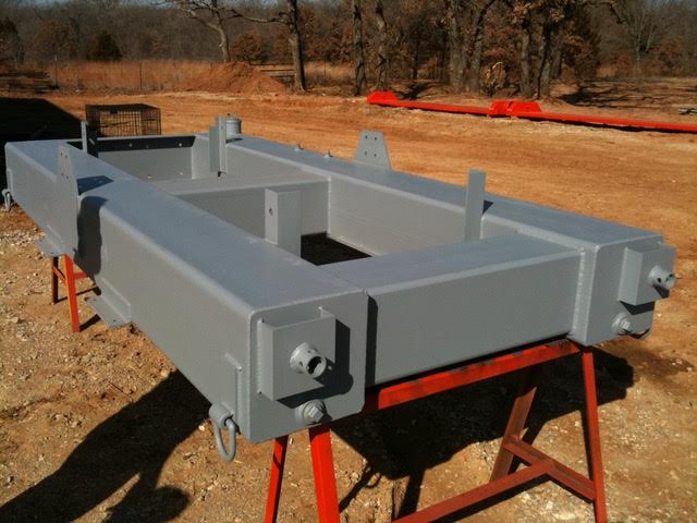 This is a photo of a custom fabricated lifting weldment that was built in the field for a client in the East Texas area.  This weldment used thick and large steel square tubing and metal plate. This piece shows our customization capabilities for welding and fabricating.