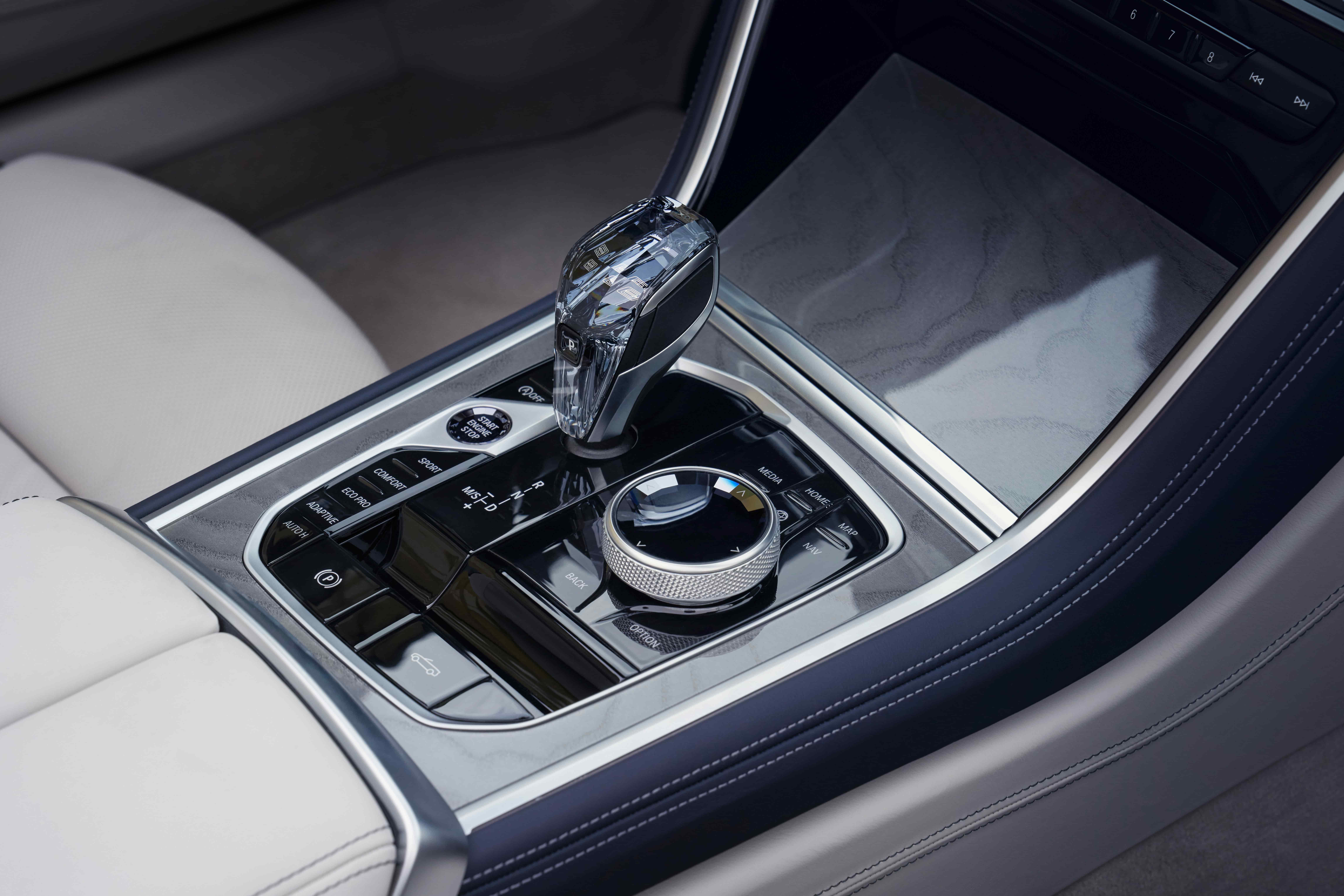 Close-up of the BMW M850i xDrive interior showing the center console and gear selector
