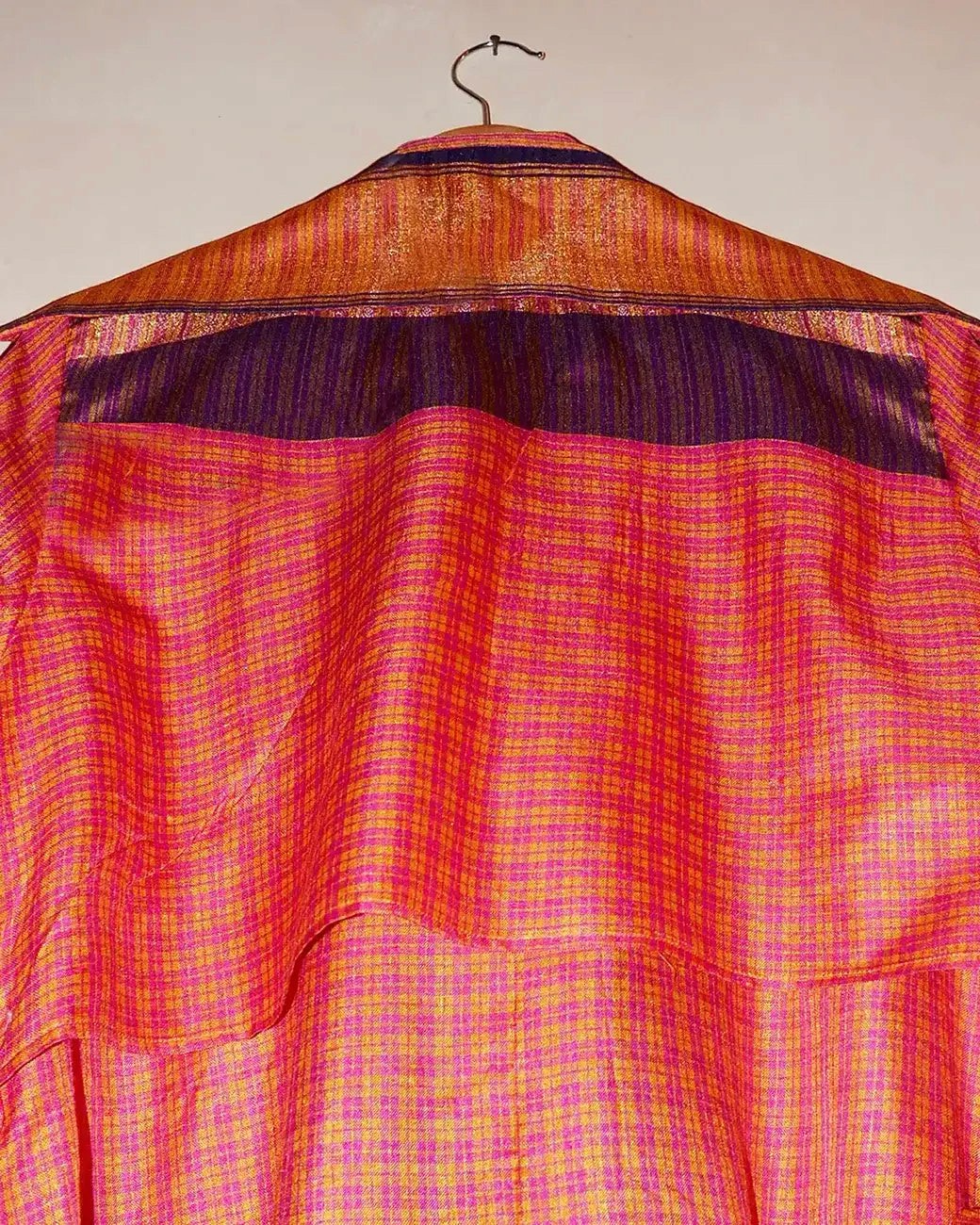 Lightweight, versatile, and full of character, this trench coat is a true celebration of heritage craft, conscious making, and enduring style—a statement layer that moves seamlessly from day to evening.