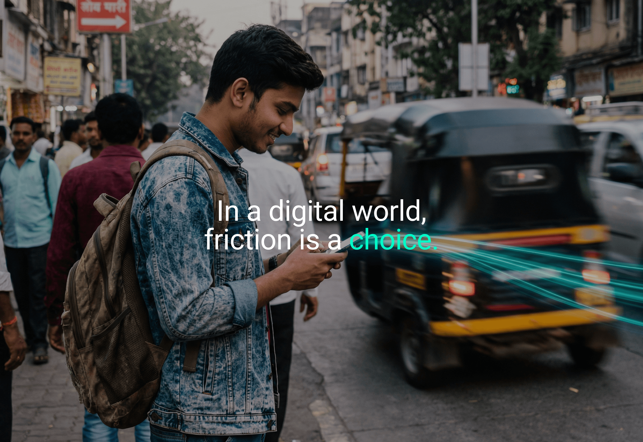 Two people sit across a table in a stylish room with red velvet walls and a large red pendant light. The mood is intimate and modern.