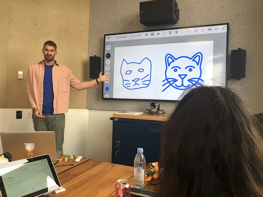 a course class with students and the teacher presenting the design lesson